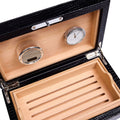 Close-up of the Rapport Brompton humidor’s cedar interior, hygrometer and humidifier set into the lid - Toro Puro