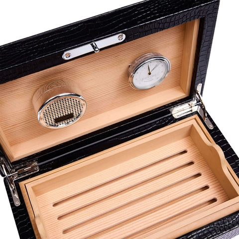 Close-up of the Rapport Brompton humidor’s cedar interior, hygrometer and humidifier set into the lid - Toro Puro