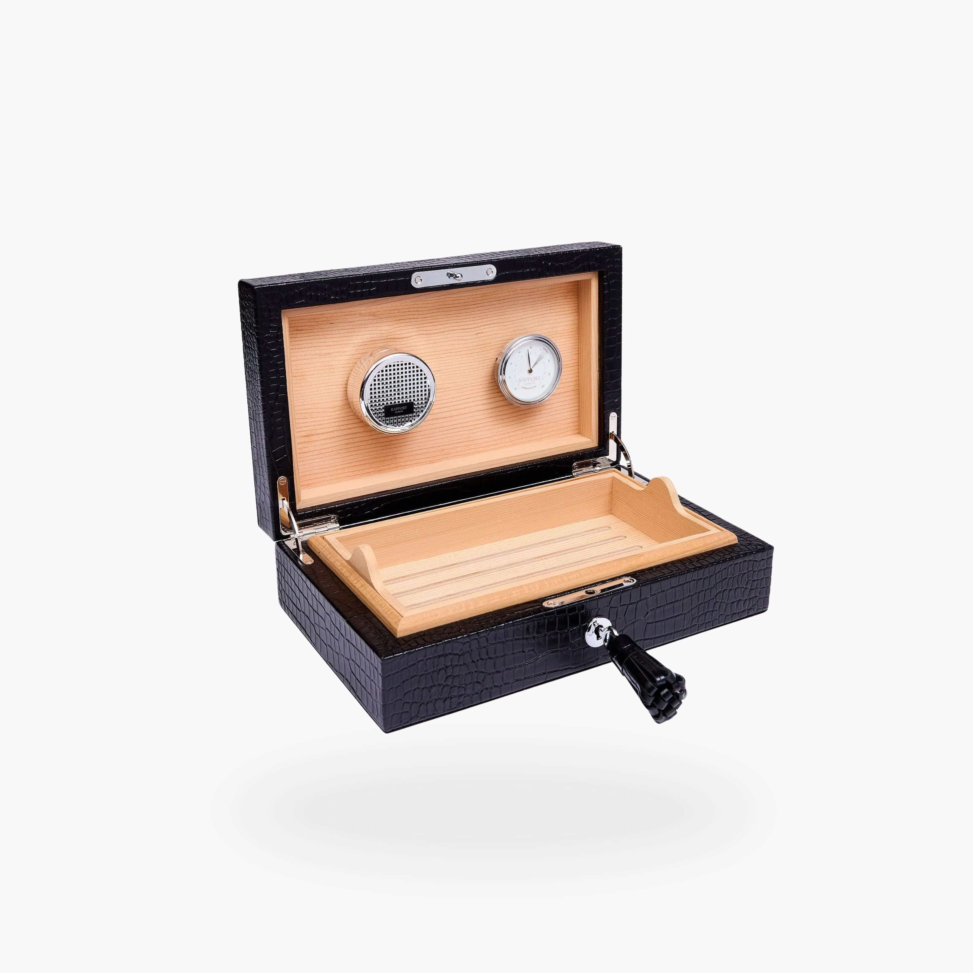 Rapport Brompton black croc-effect leather humidor open, showing cedar-lined interior with hygrometer and humidifier - Toro Puro